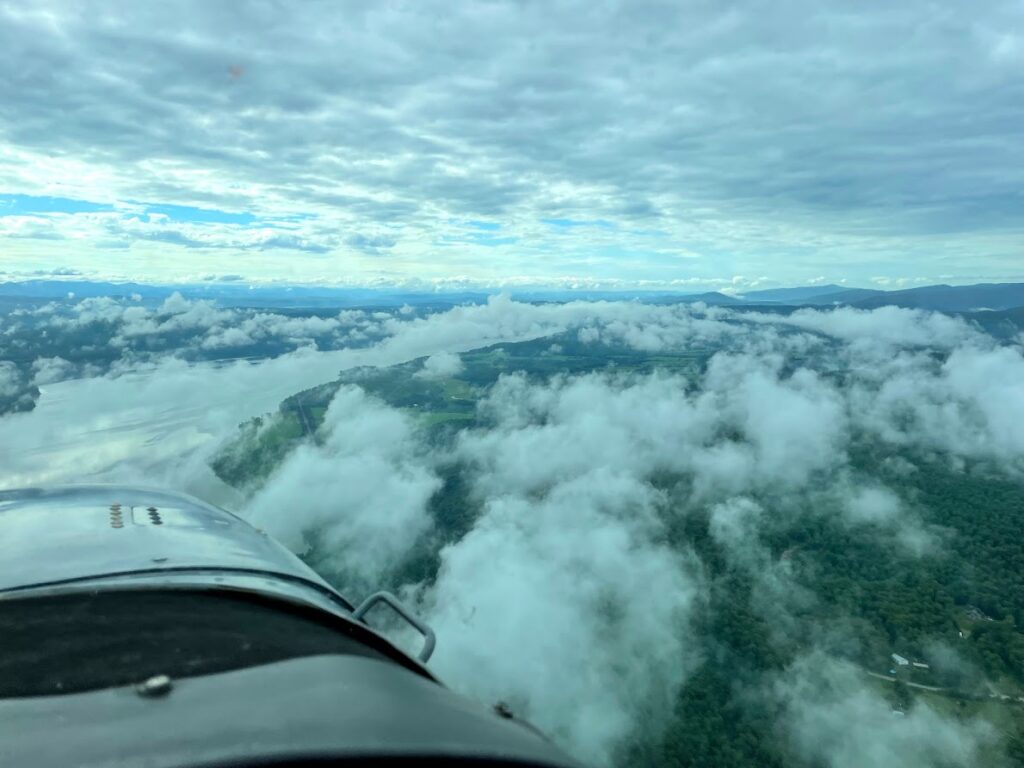 flying over clouds