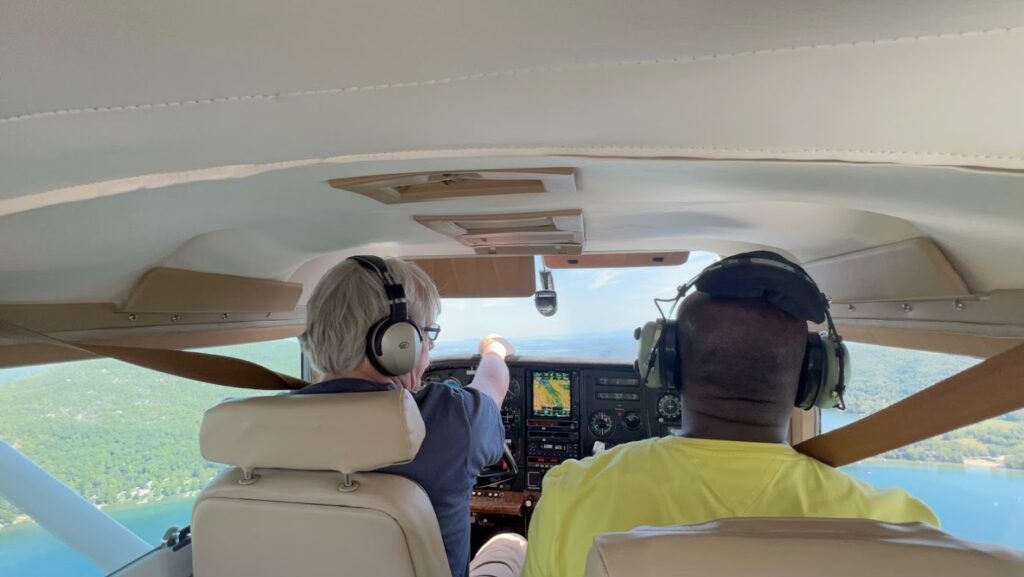 pilot and passenger in small plane